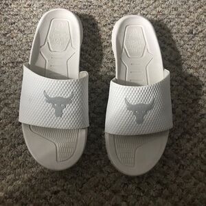 Project Rock slides. White. Size 12. Very Good condition